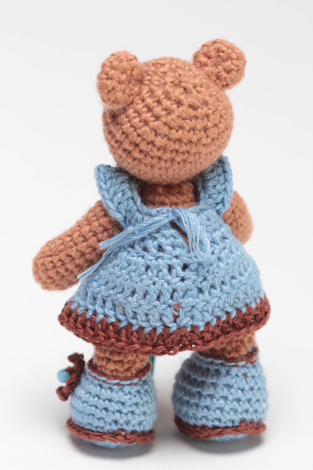 Handmade small crocheted soft toy brown bear girl in blue dress and shoes  photo 4
