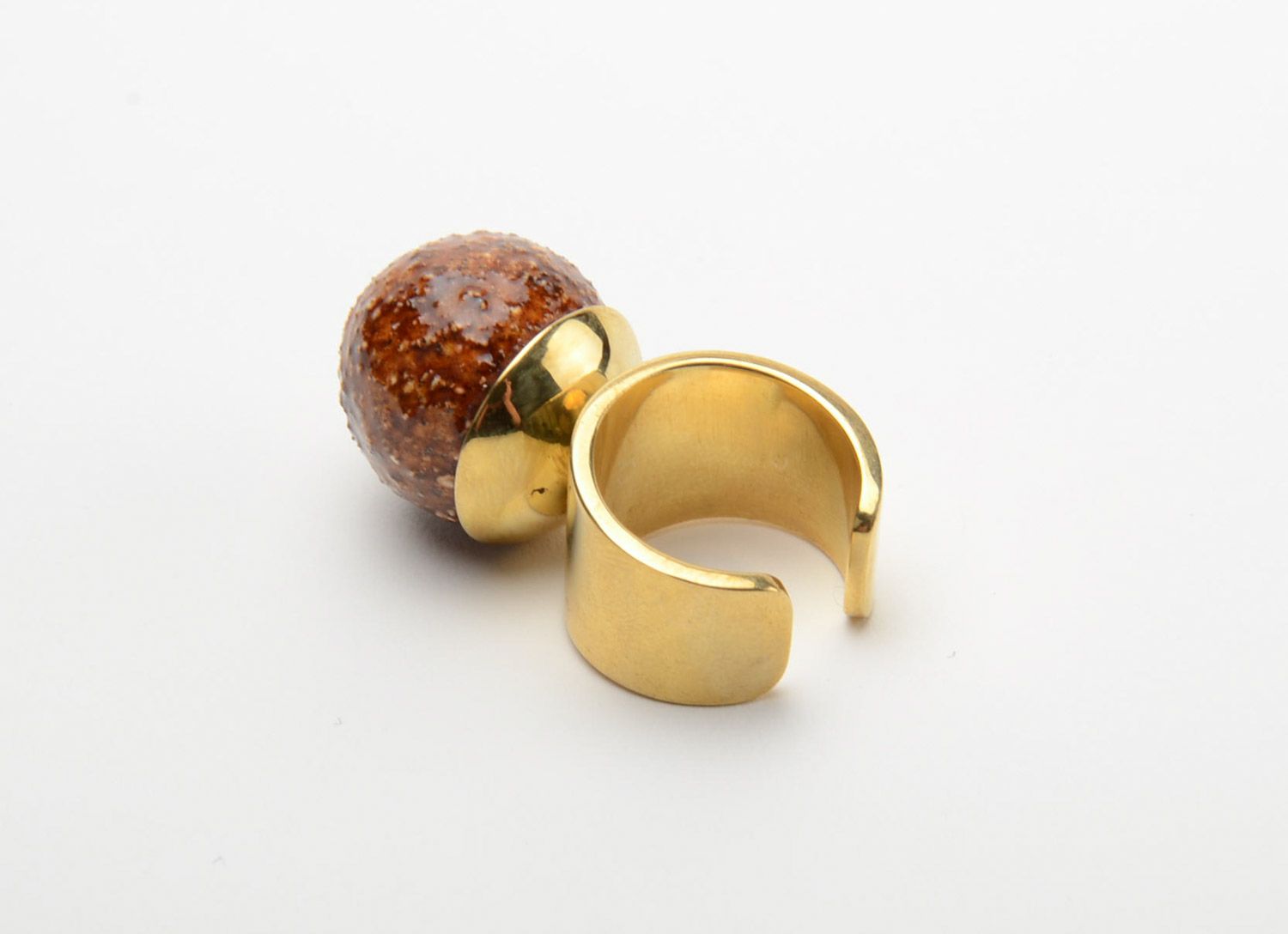 Brown handmade ceramic ring with golden-like brass basis photo 3