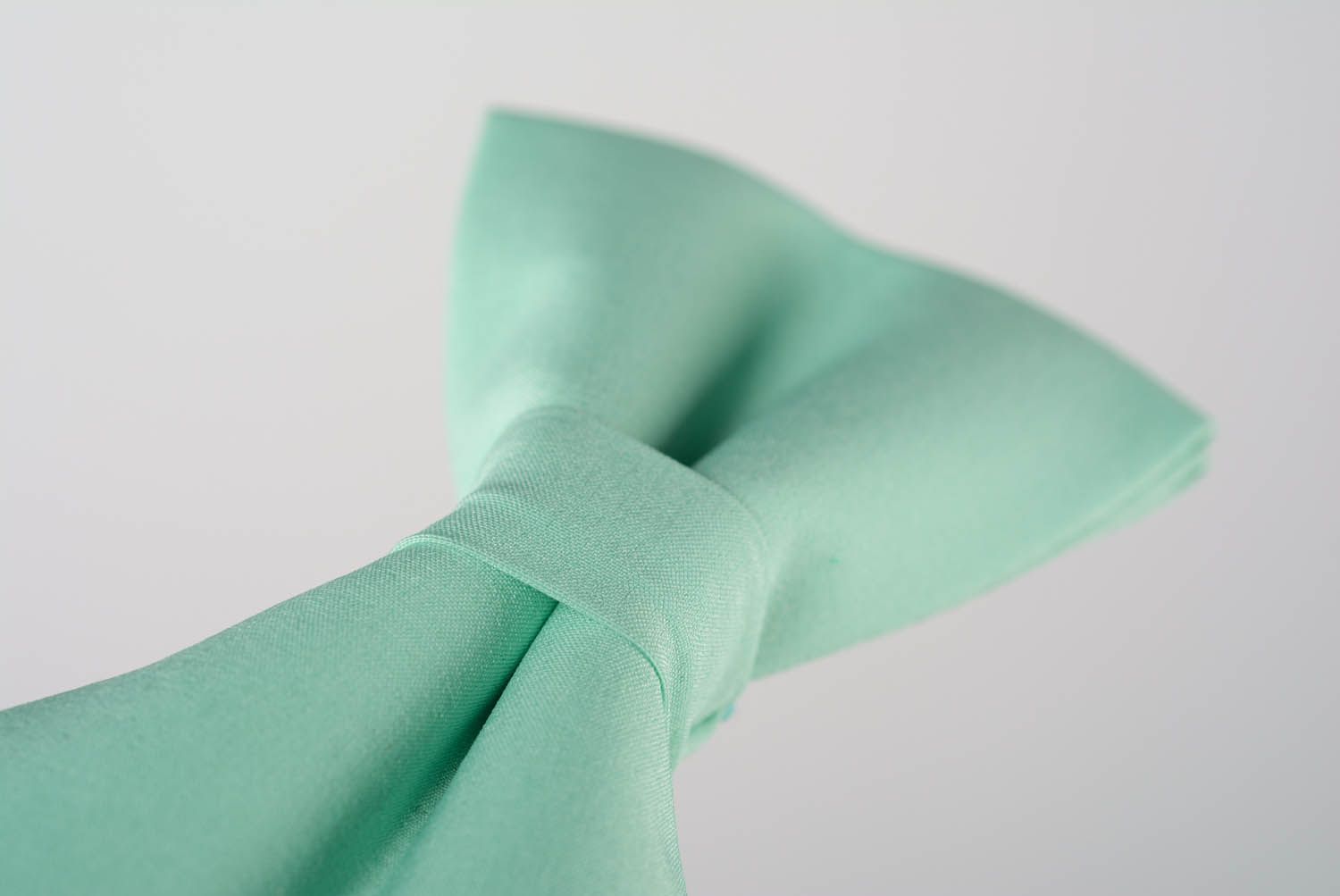 Mintgrüne Fliege Krawatte aus Textil foto 4