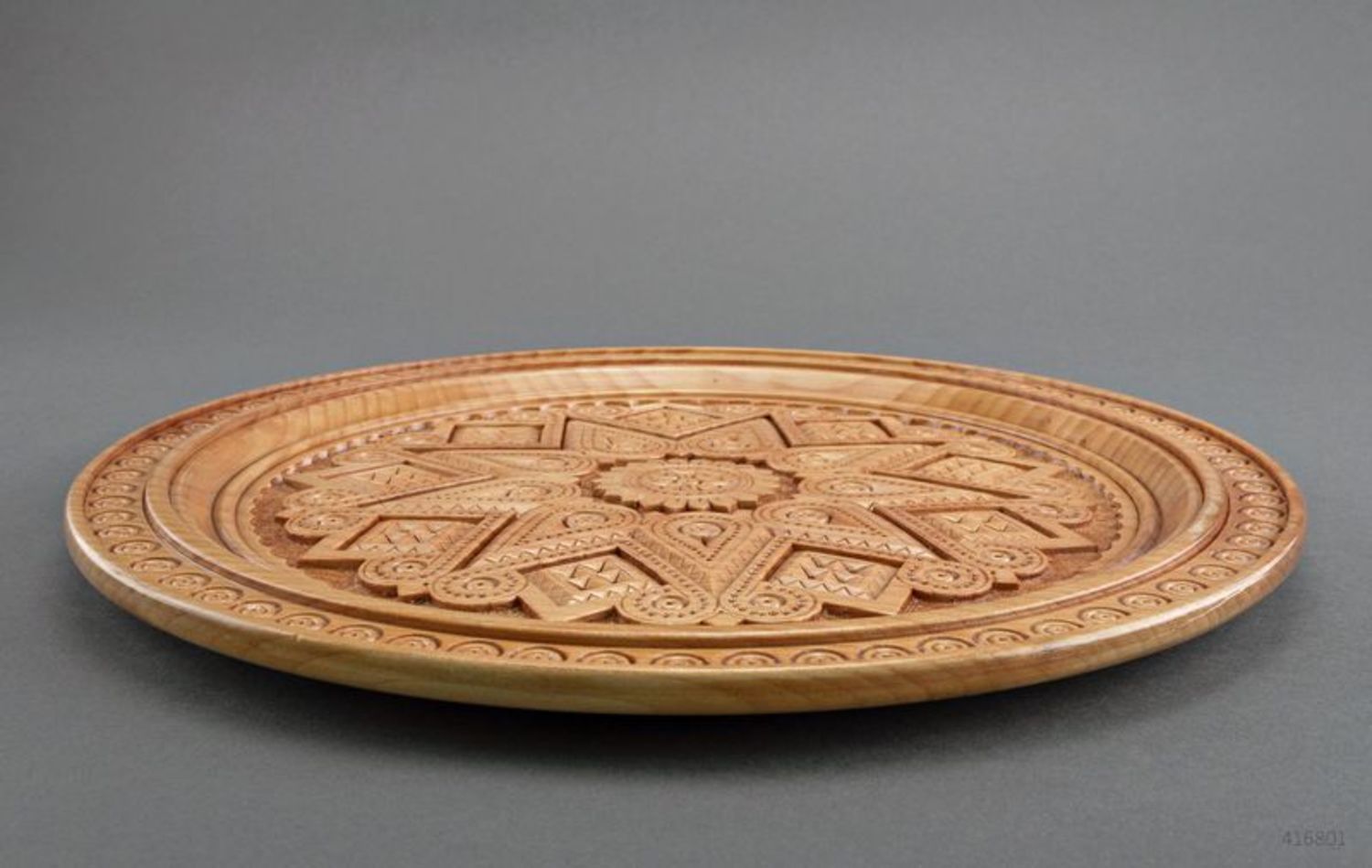 Carved wooden plate photo 2