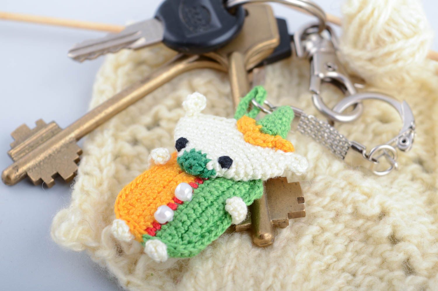Handmade decorative soft keychain in the form of bear amigurumi toy photo 1