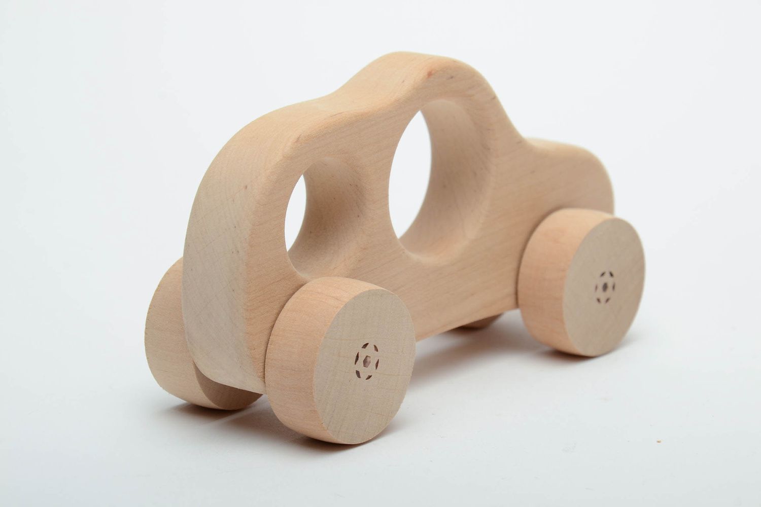 Wooden wheeled toy car photo 3