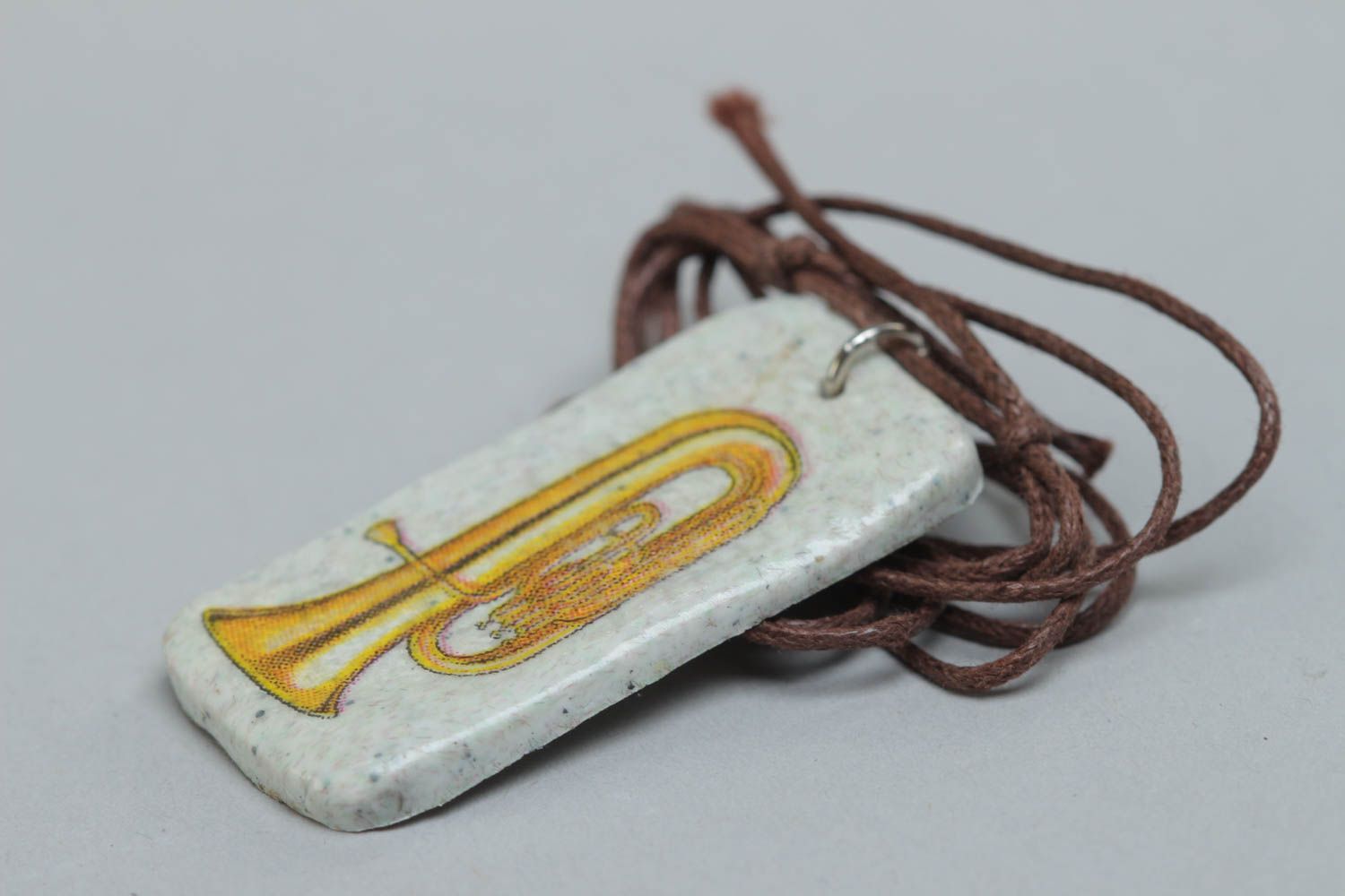 Handcrafted rectangle pendal made of polymer clay on a cord photo 3