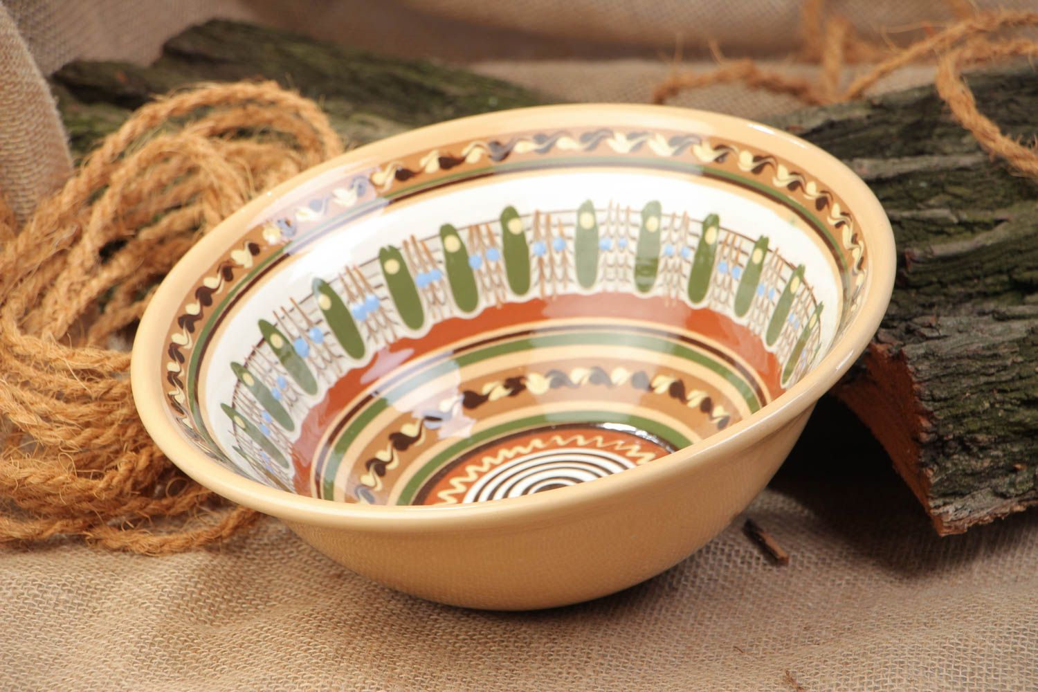 Handmade decorative richly ornamented ceramic bowl coated with glaze for 1.3 l photo 1