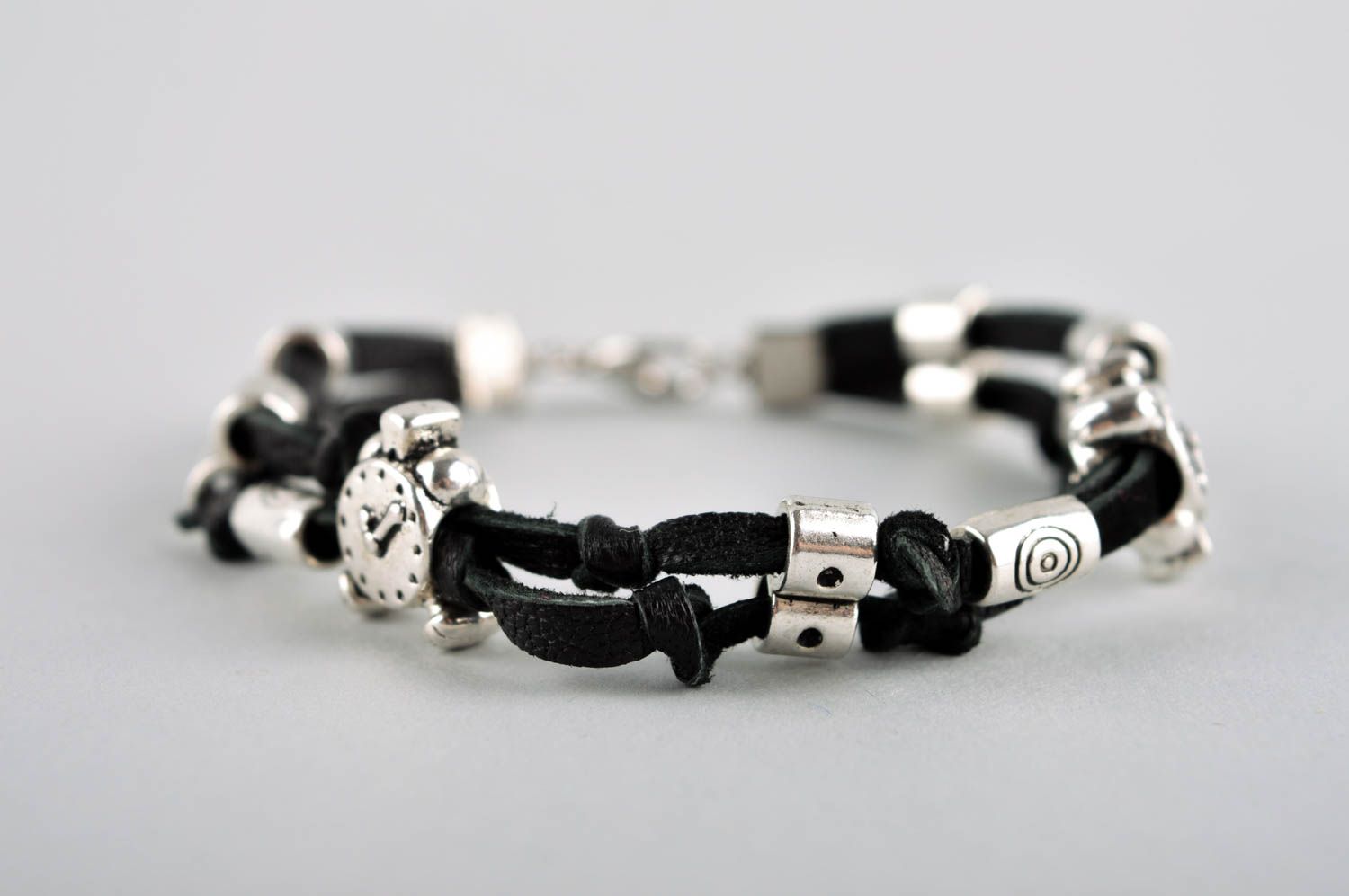 Handmade black cord bracelet with unisex metal charms and beads photo 3