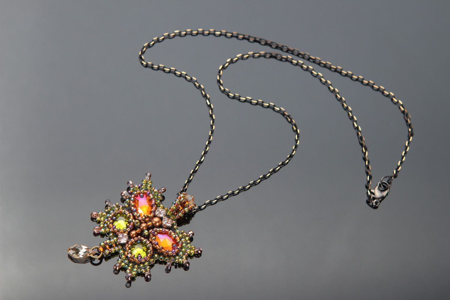 Handmade luxurious pendant embroidered with golden beads on long chain dragonfly photo 1