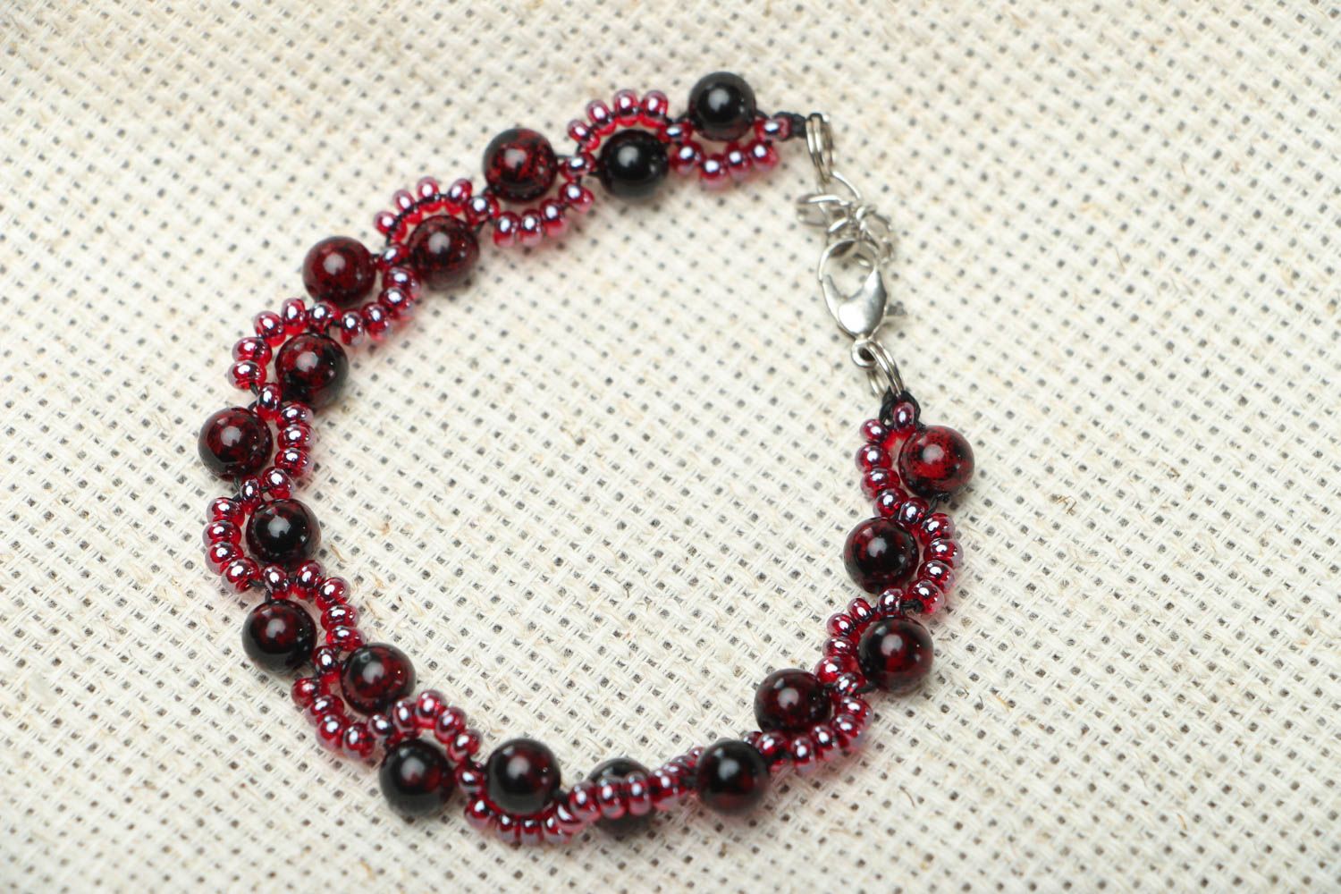 Homemade bracelet with beads and garnet photo 1