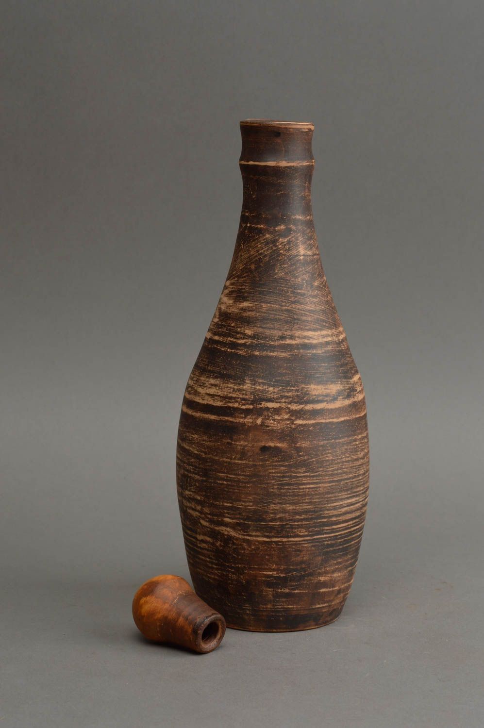 Potter designer handmade bottle made of red clay Wavy milk firing 500 ml photo 3