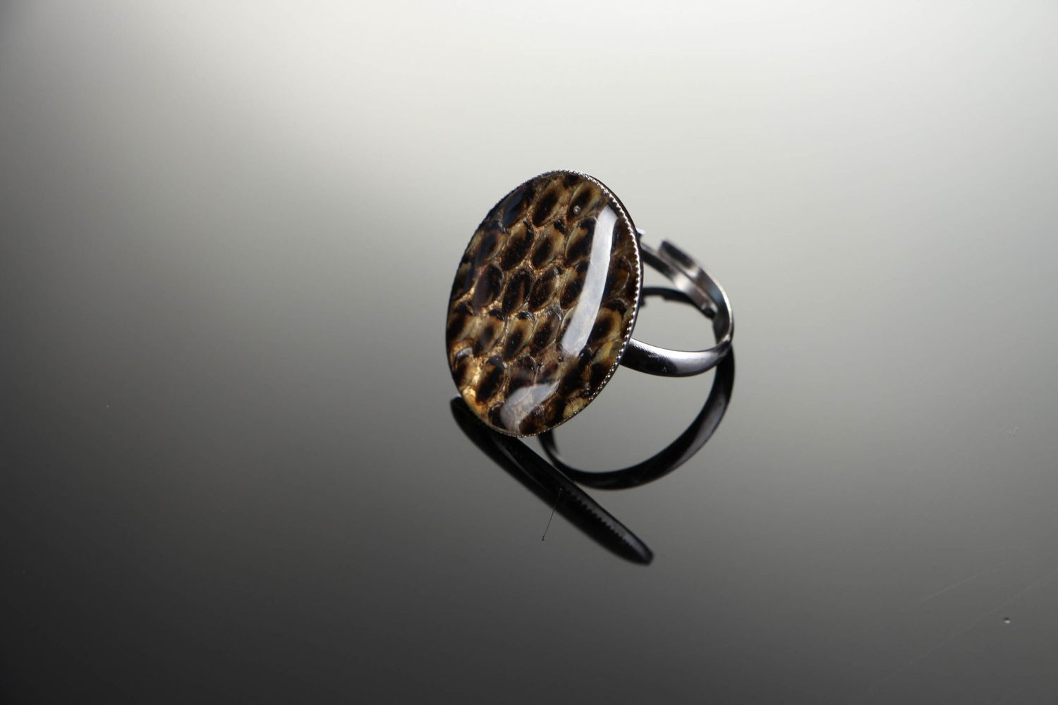 Ring made of epoxy and costume jewelry alloy Snake leather photo 1