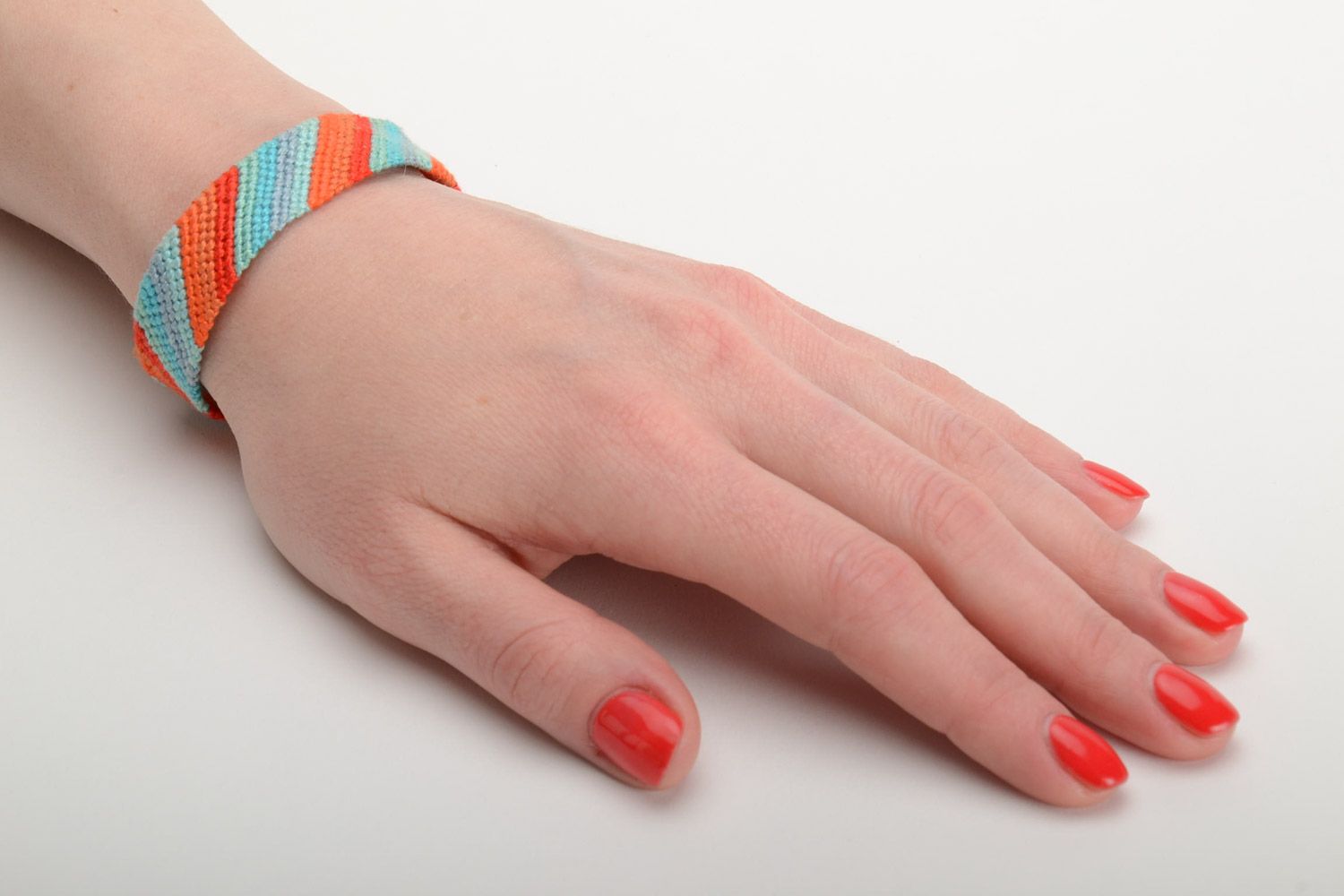Bracelet tressé fait main rayures en fils moulinés accessoire stylé bleu orange photo 5