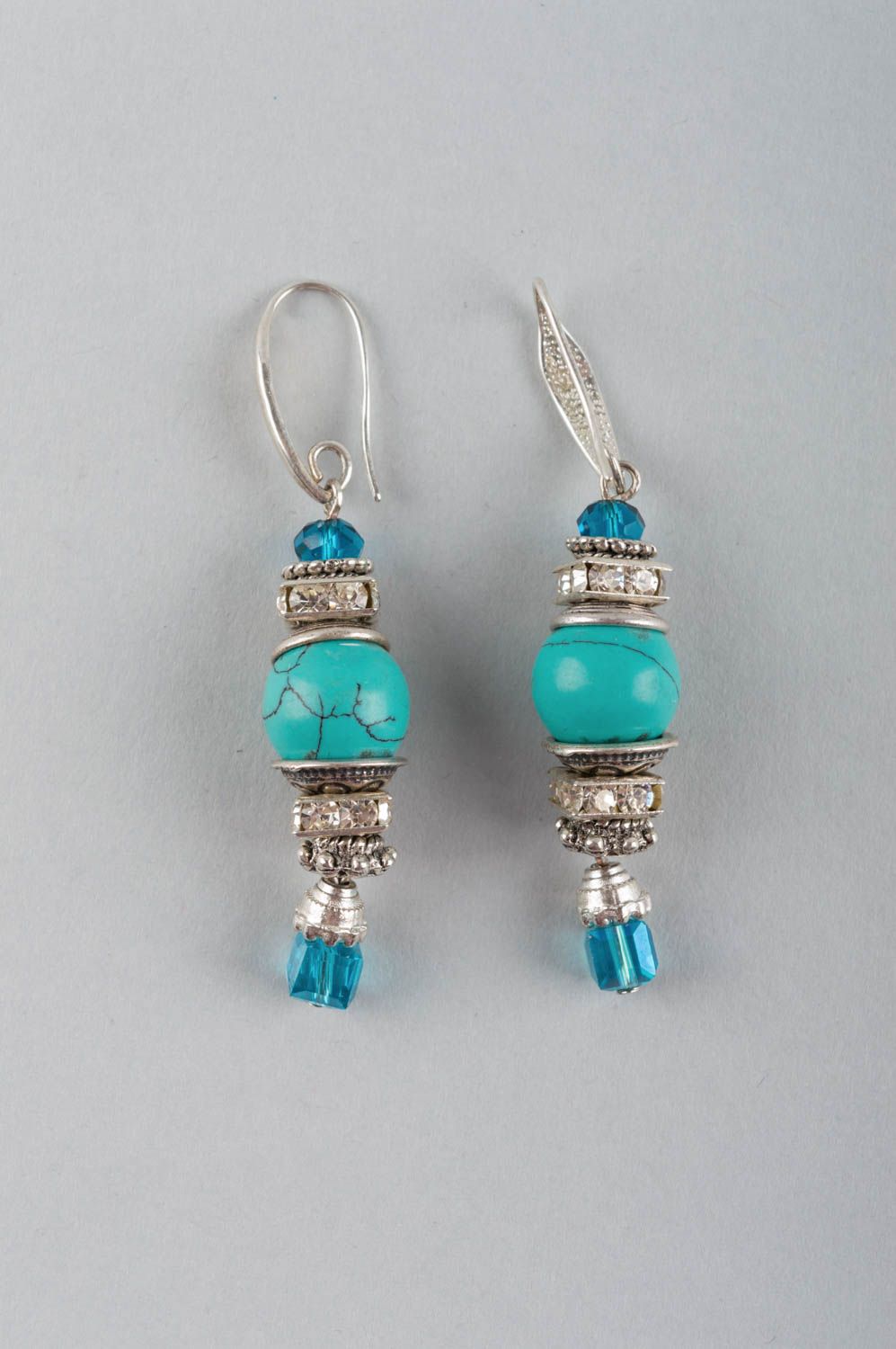 Elegant long handmade designer metal earrings with natural turquoise stone photo 2