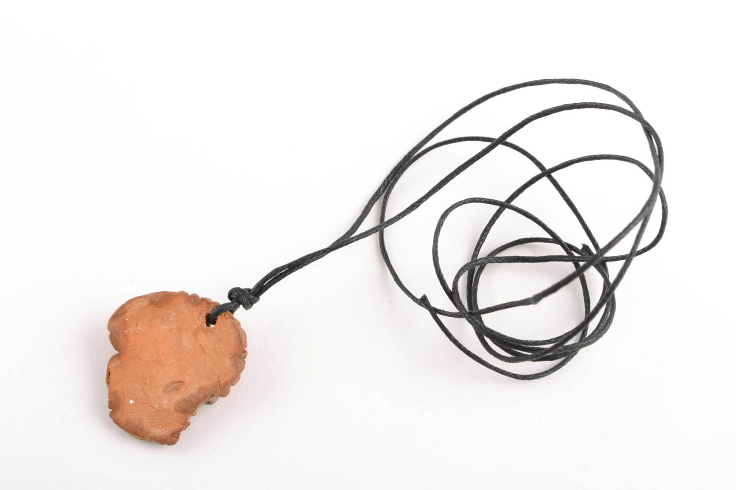 Ethnic clay pendant with cord photo 4