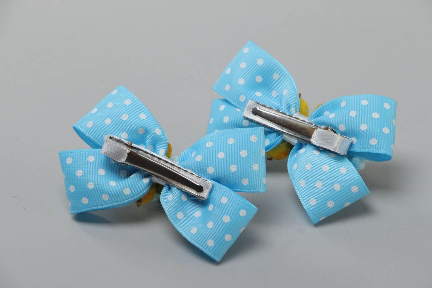 Set of 2 handmade hair clips with small bright blue polka dot rep ribbon bows photo 4