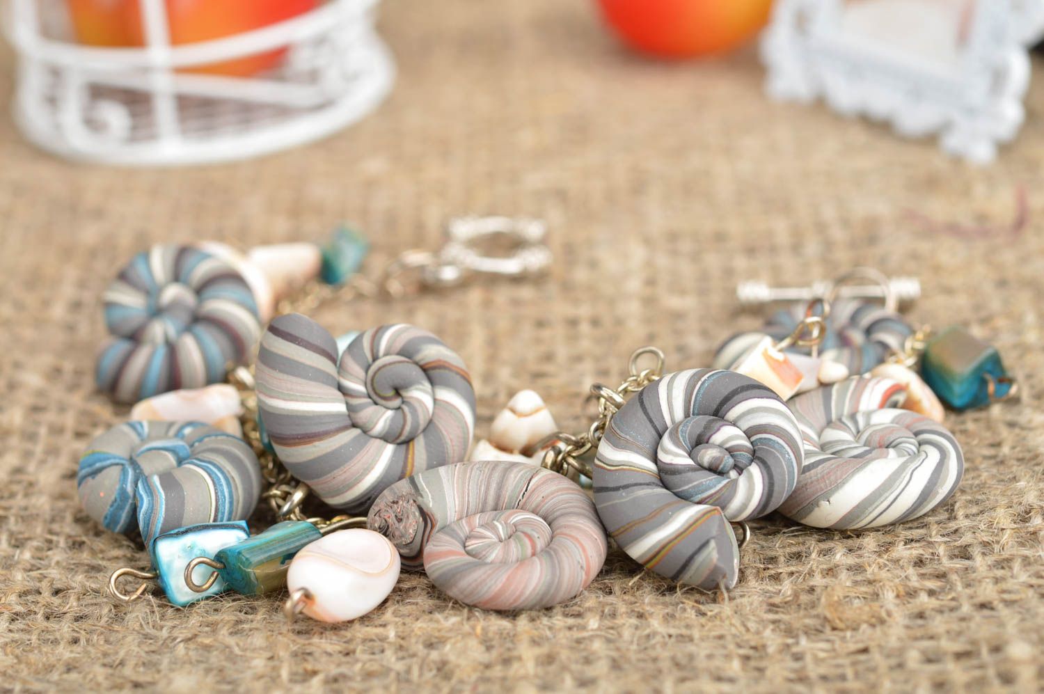 Handmade bracelet made of polymer clay on chain decorated with striped shells photo 1