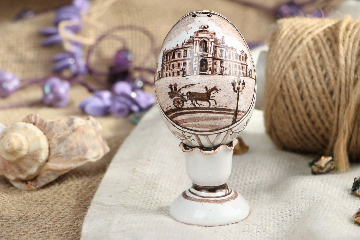Ceramic egg on pedestal photo 5