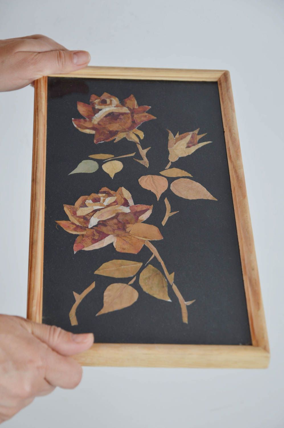 Handmade decorative picture collage with dried leaves and petals on black fabric photo 3
