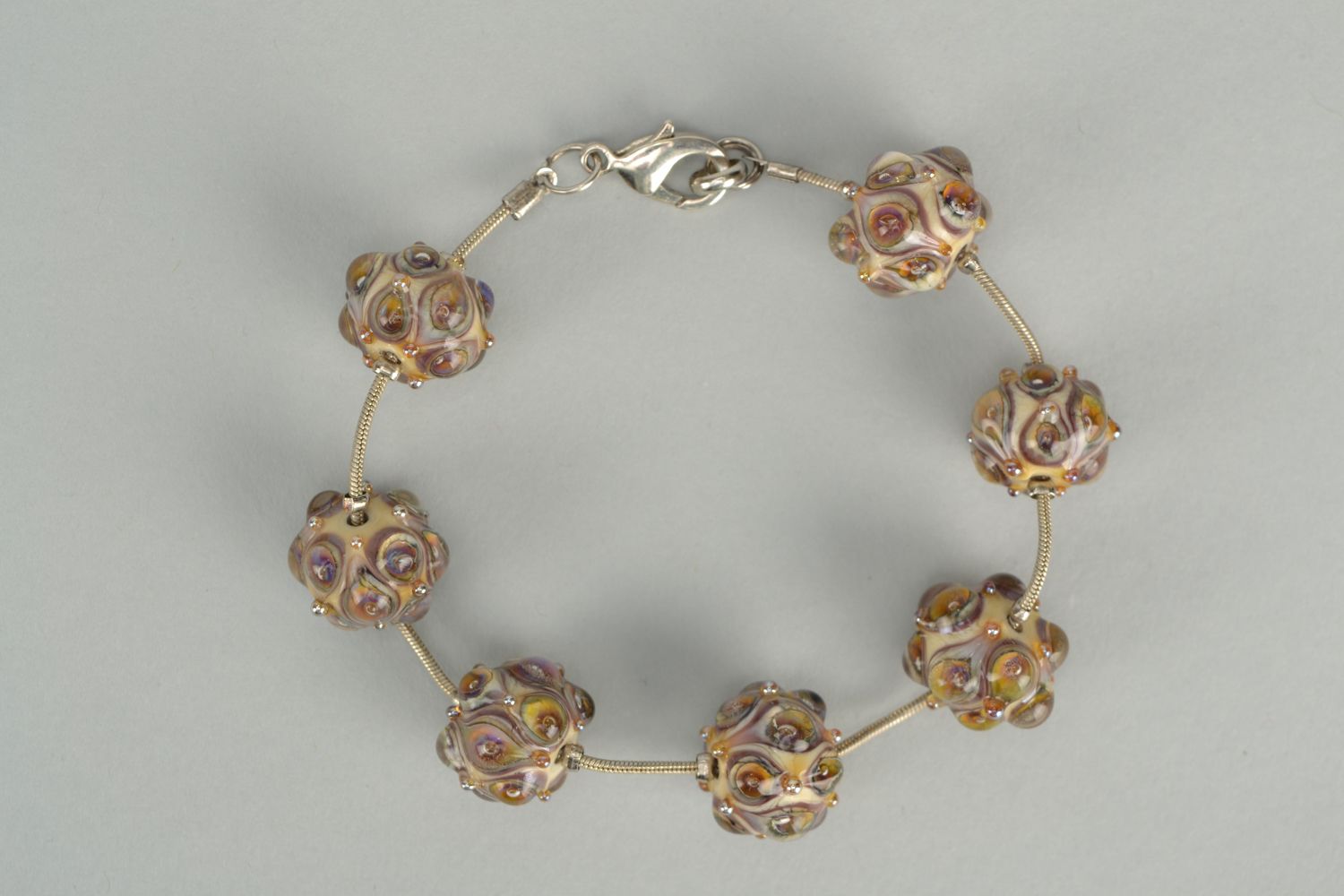 Unusual handmade bracelet with glass beads photo 1