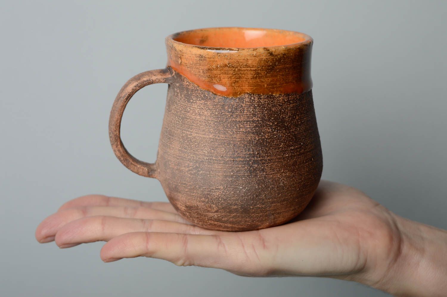 10 oz handmade rustic style design light brown and orange color clay cup with handle, glazed inside photo 3