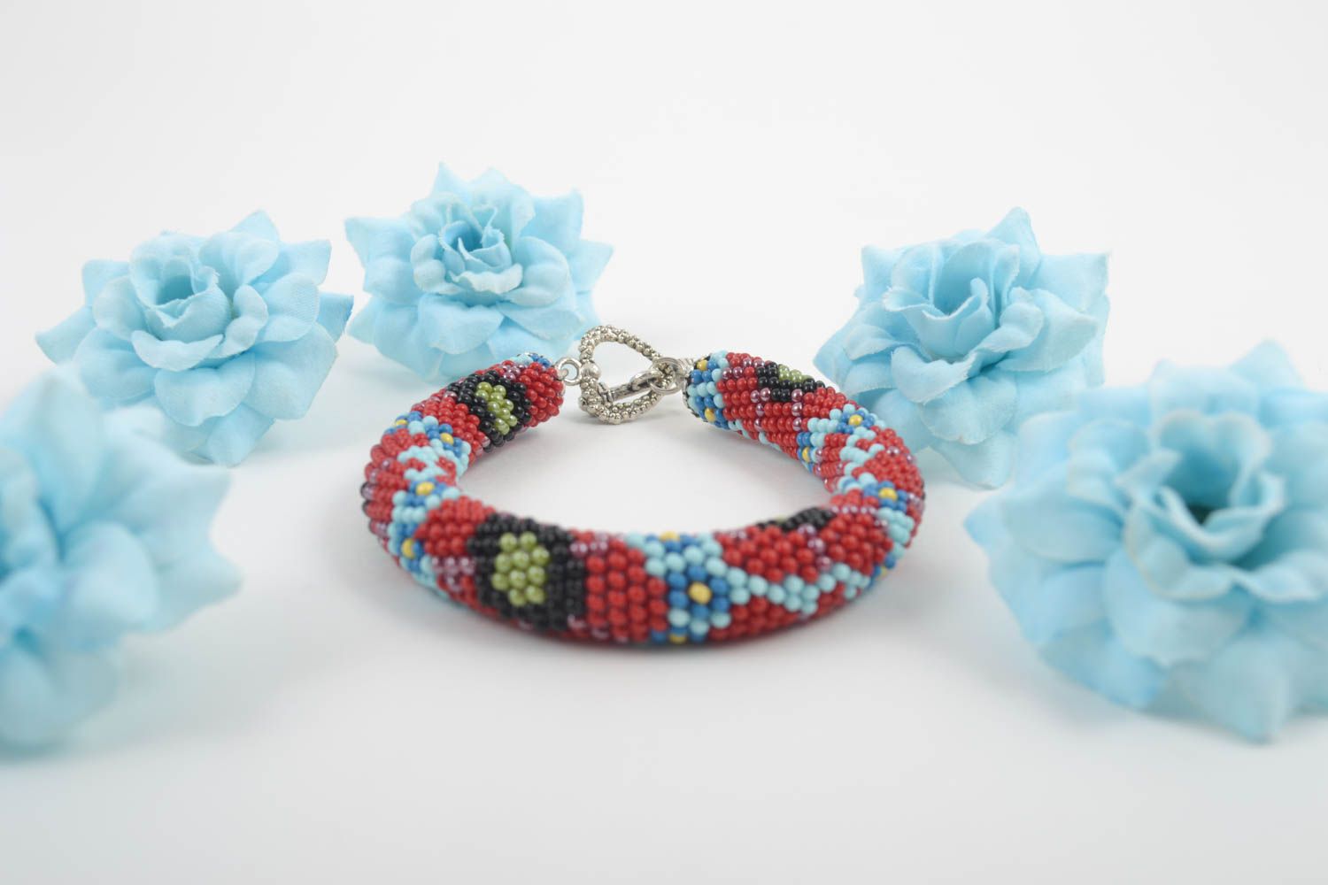 Handmade beaded cord bracelet with heart shape lock and floral ornament photo 1