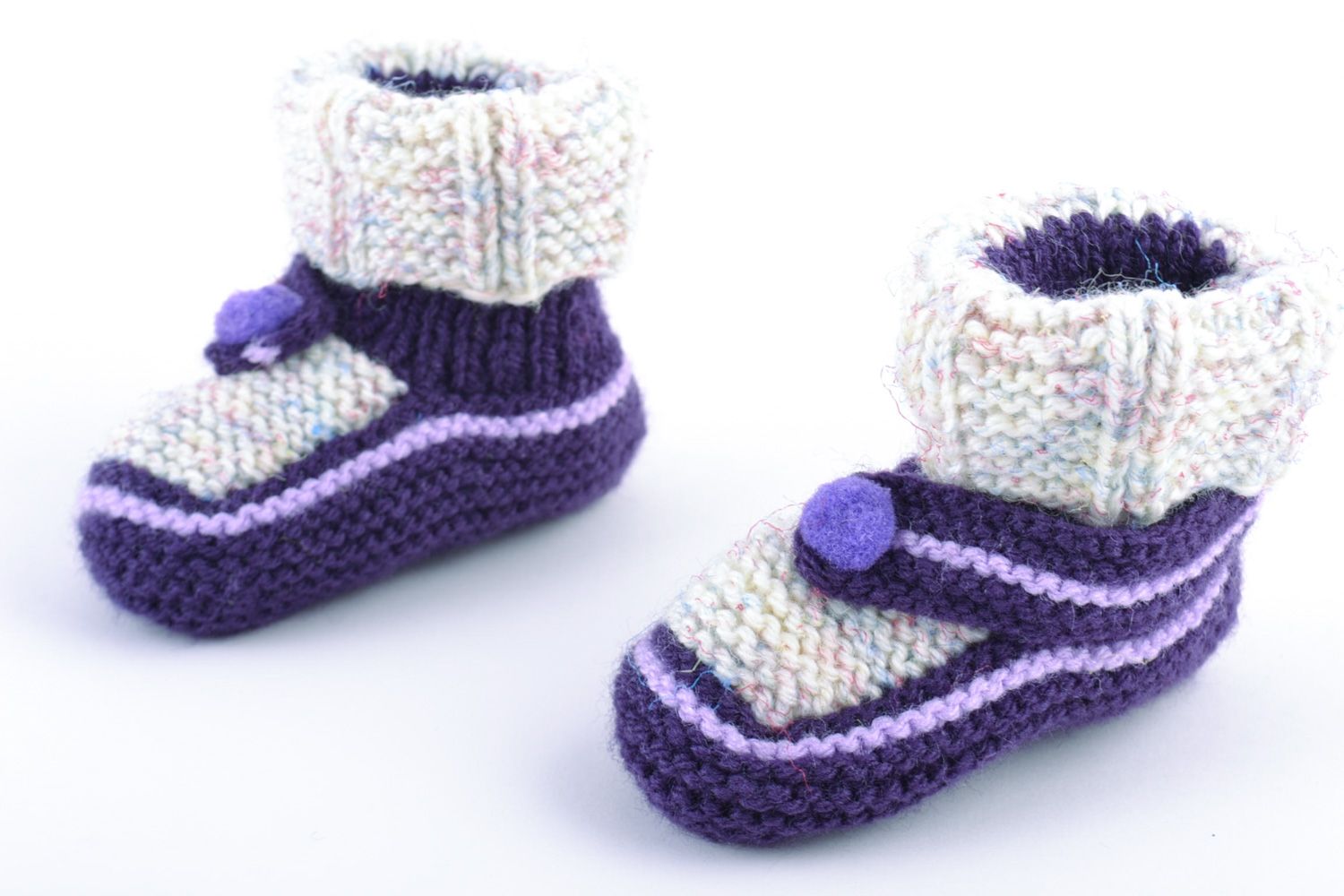 Chaussons bébé tricotés faits main en laine originaux et pratiques pour enfant photo 3