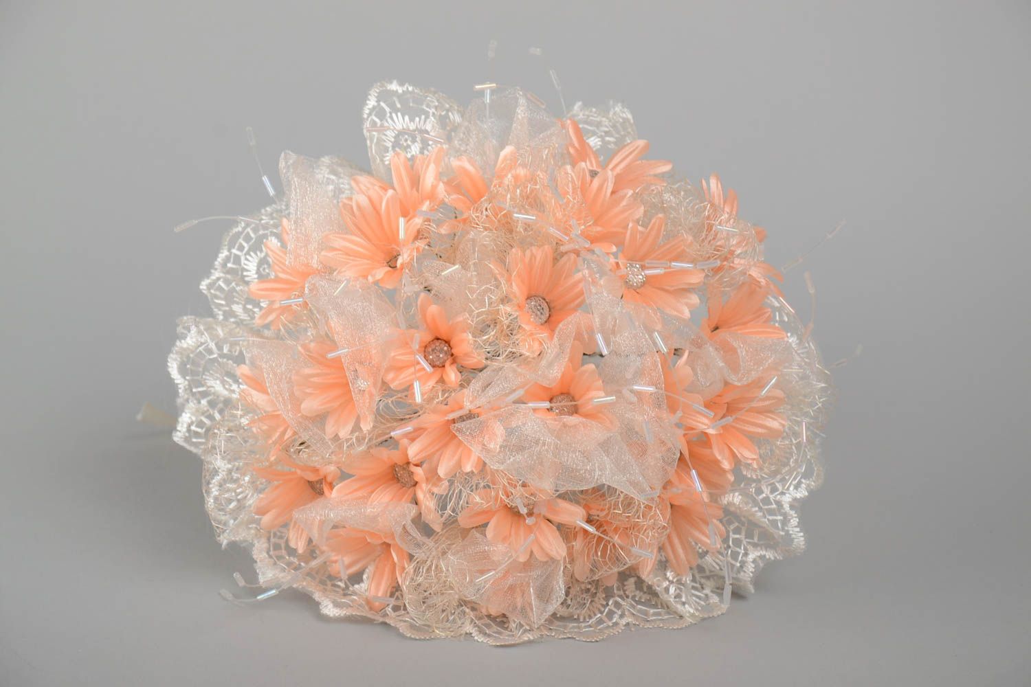 Beautiful handmade wedding bouquet of artificial flowers of peach color photo 2