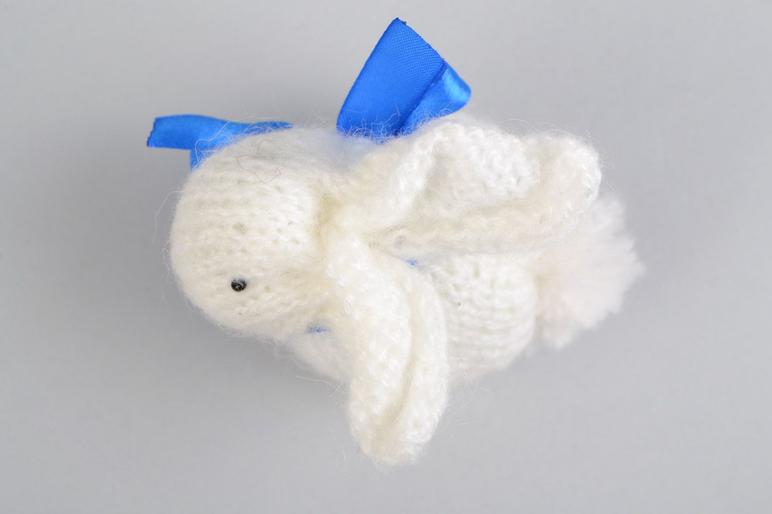Handmade small soft toy Easter rabbit knit of angora wool with blue bow photo 3