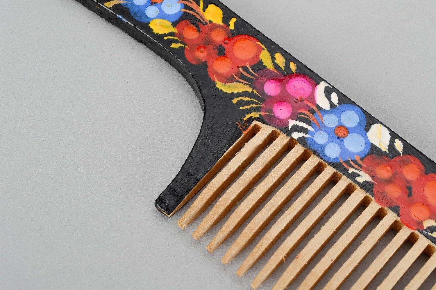 Wooden comb with painting photo 2