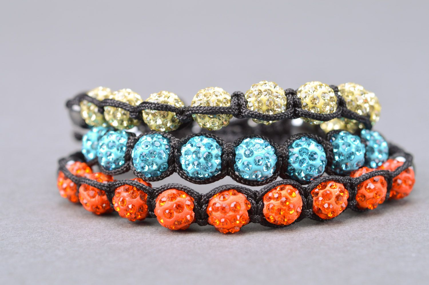 Set of beautiful designer handmade women's wrist bracelets woven of threads and beads 3 items photo 5