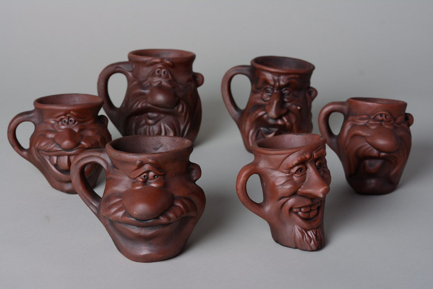 Set of 6 six ceramic handmade drinking cups in the shape of different funny faces  photo 1