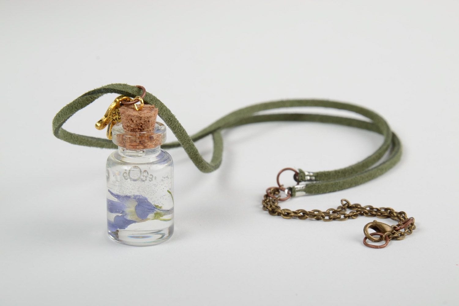 Beautiful handmade neck pendant with real flowers in epoxy resin vial photo 4