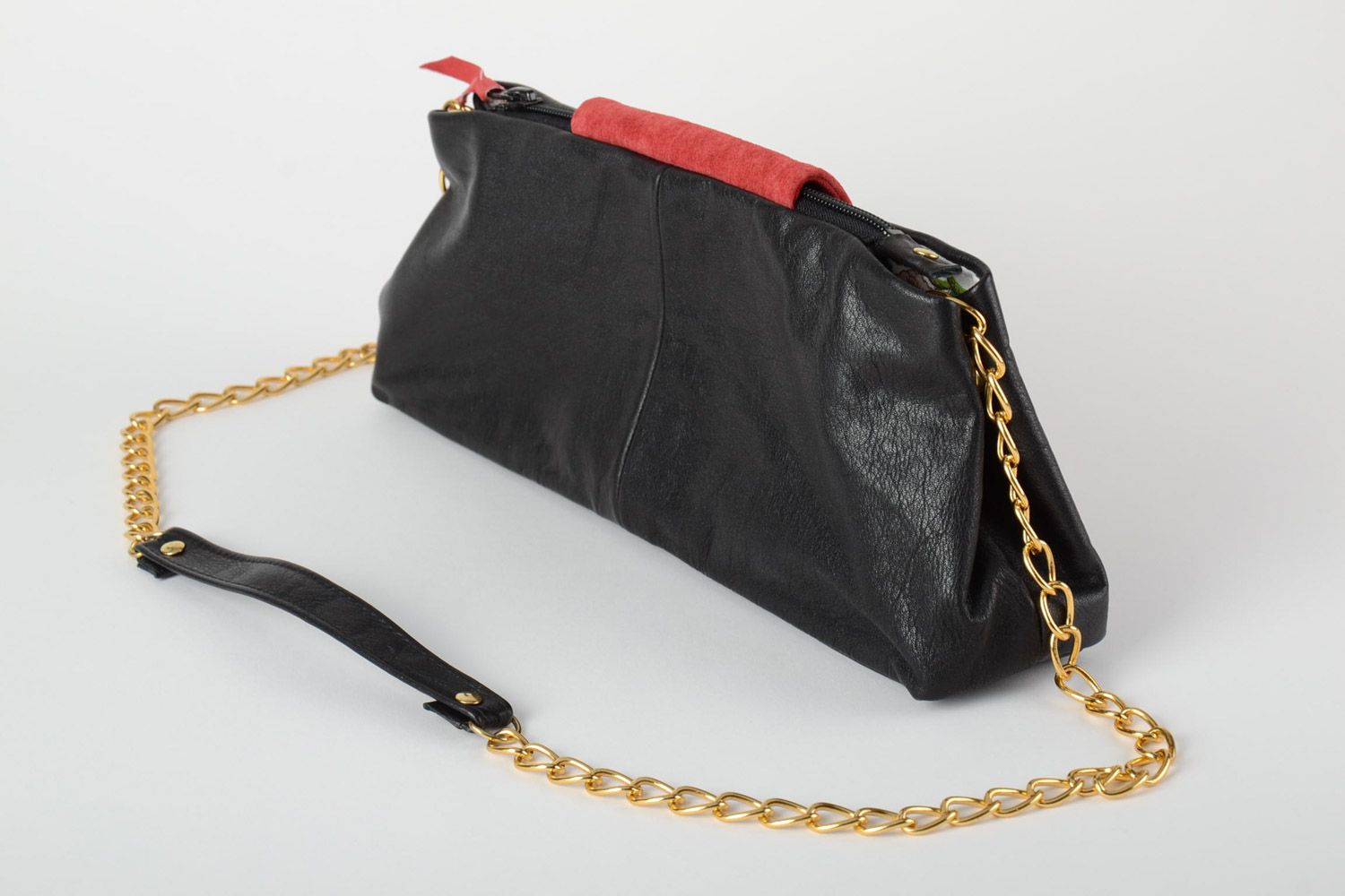 Handmade women's clutch bag sewn of black genuine leather with red inserts on chain photo 4