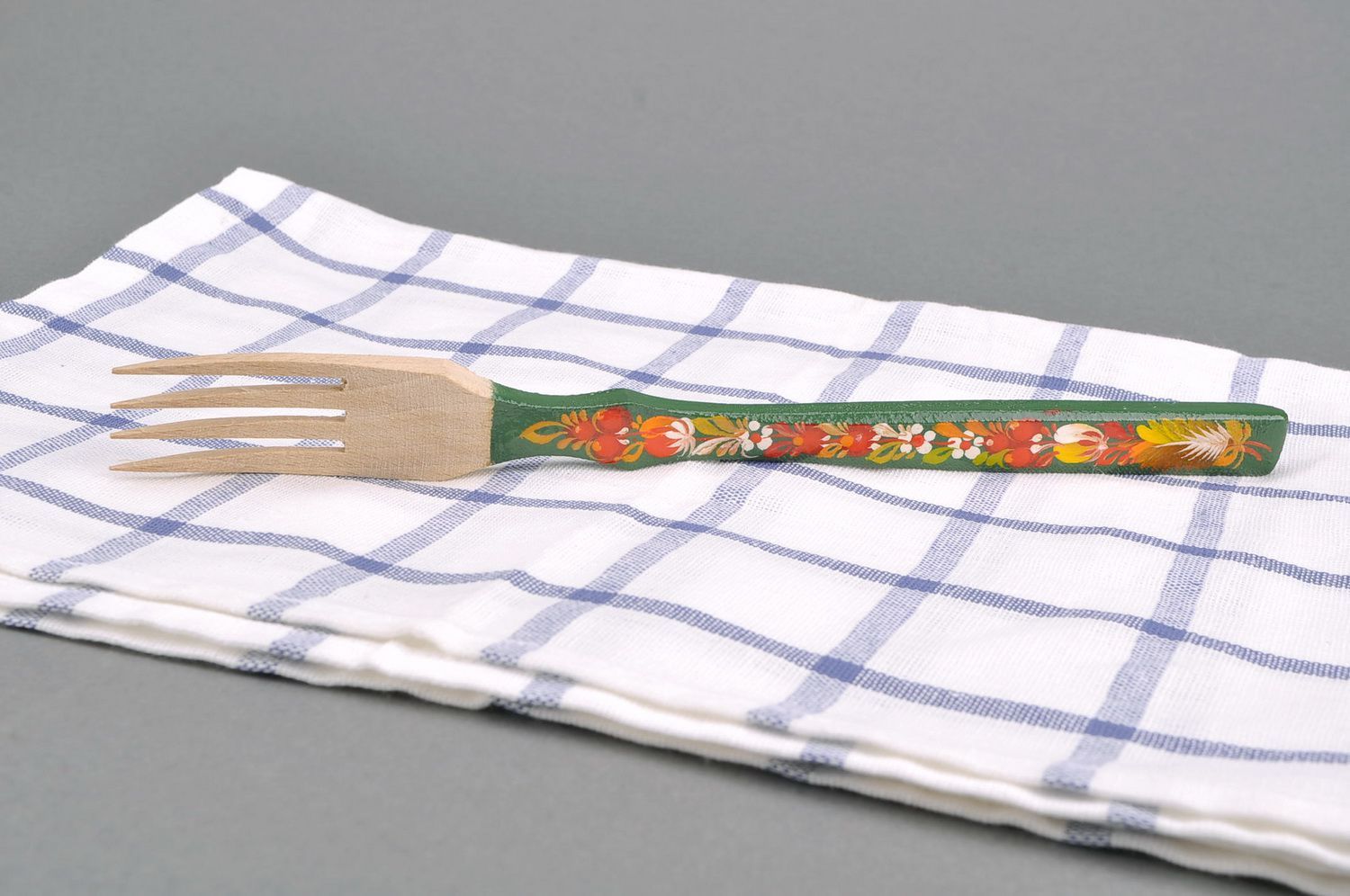 Wooden fork with green handle photo 5