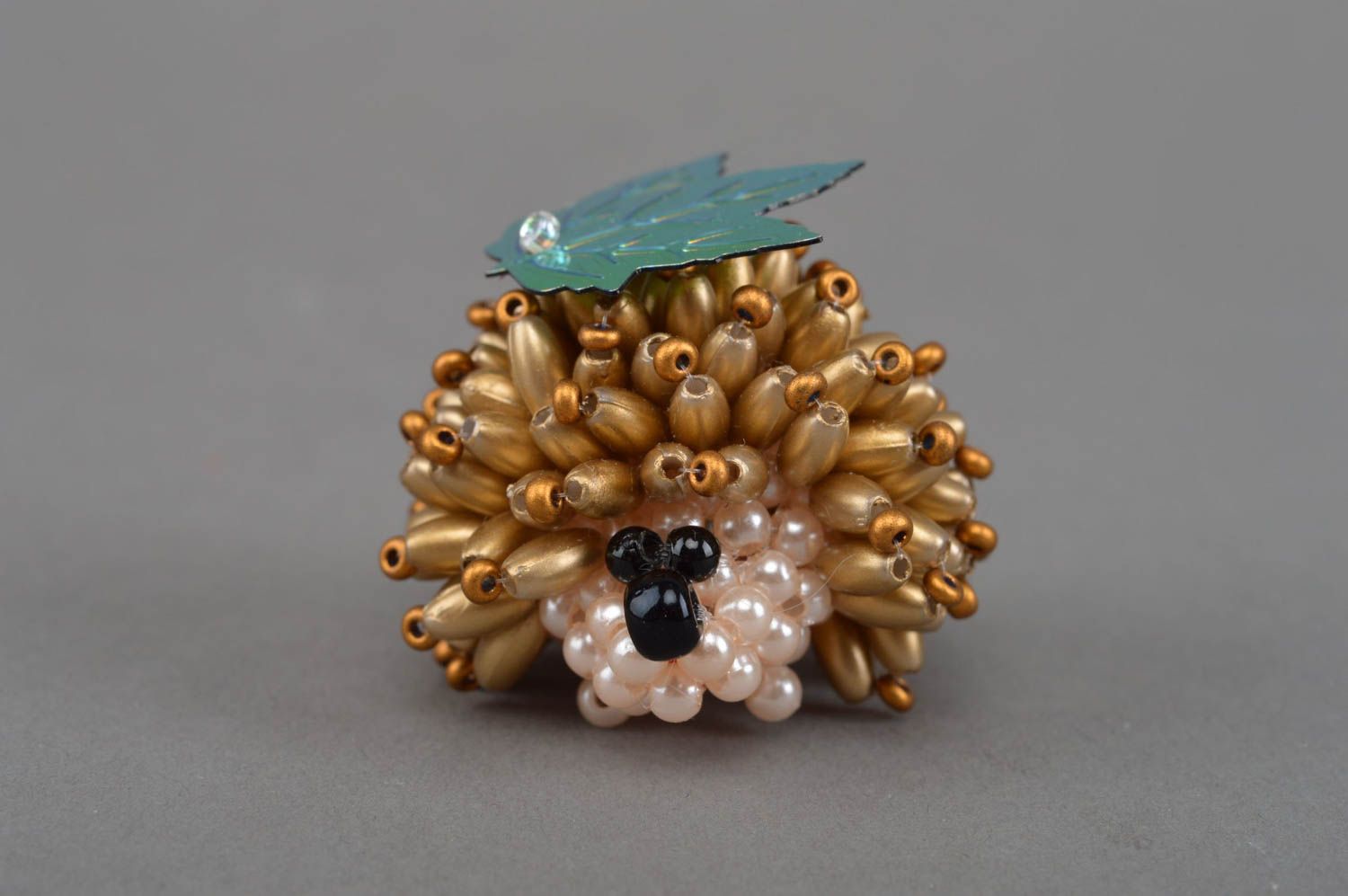 Small decorative designer handmade beaded animal figurine of golden hedgehog  photo 4