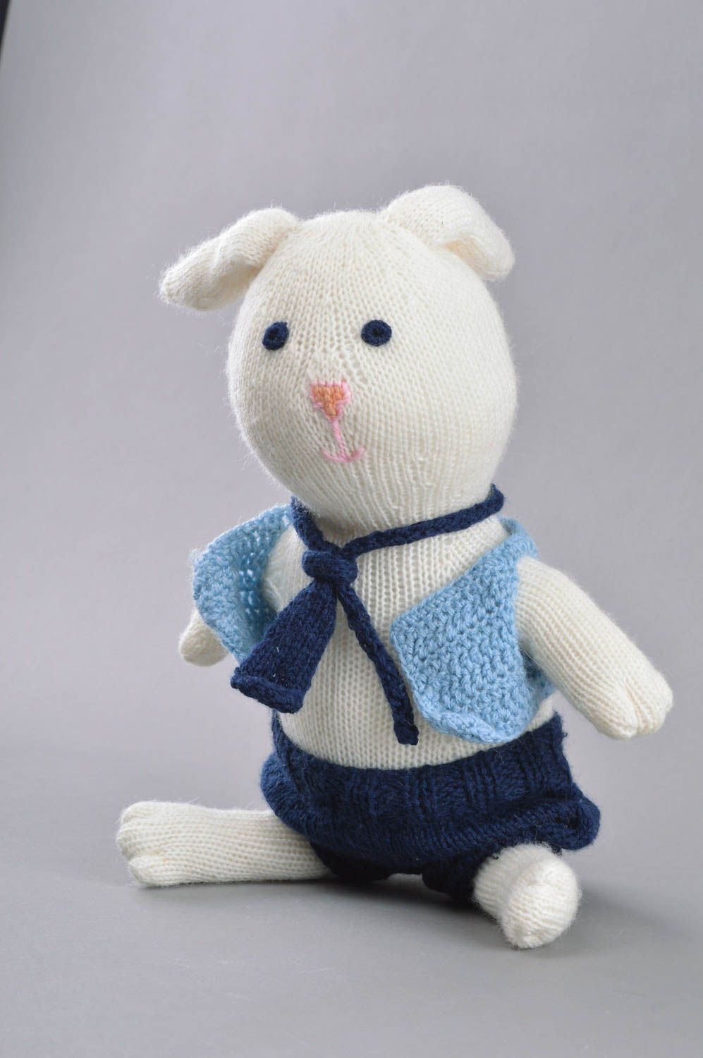 Handmade decorative crocheted toy white hare in shorts made of wool home decor photo 3