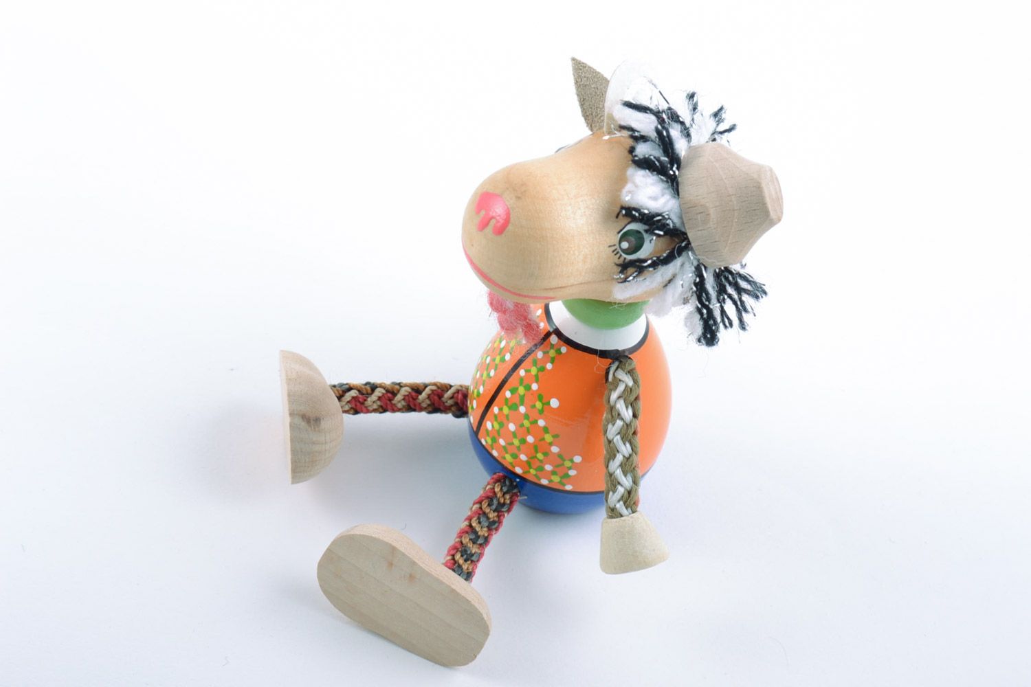 Eco friendly homemade painted wooden toy in the shape of goat photo 4