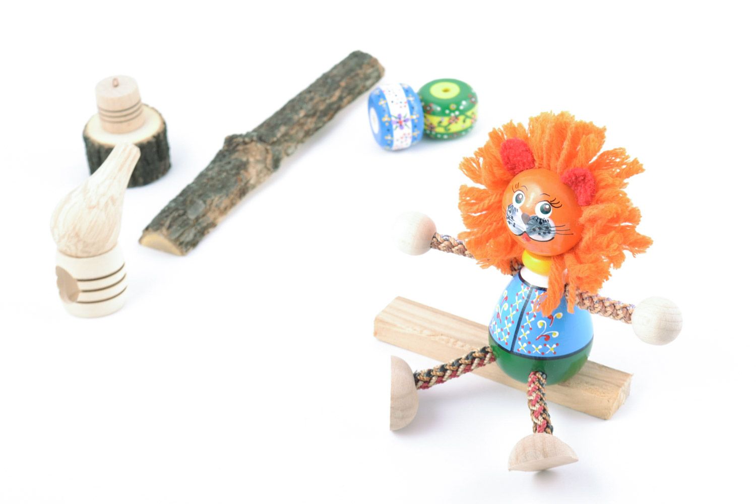Handmade small painted eco friendly wooden toy lion with large orange mane photo 1