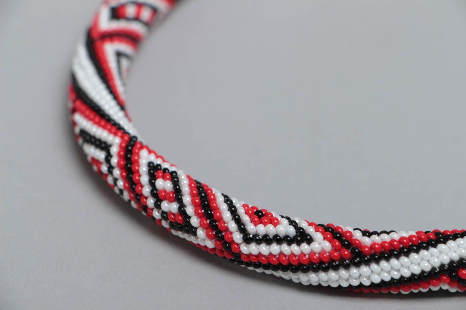 Handmade designer beaded cord necklace with ornament of vyshyvanka style photo 4