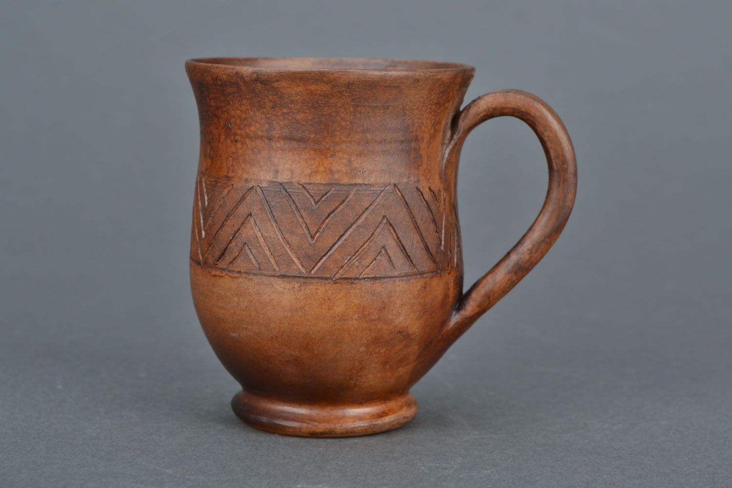 Clay teacup in brown natural color with handle and Greek-style pattern photo 3