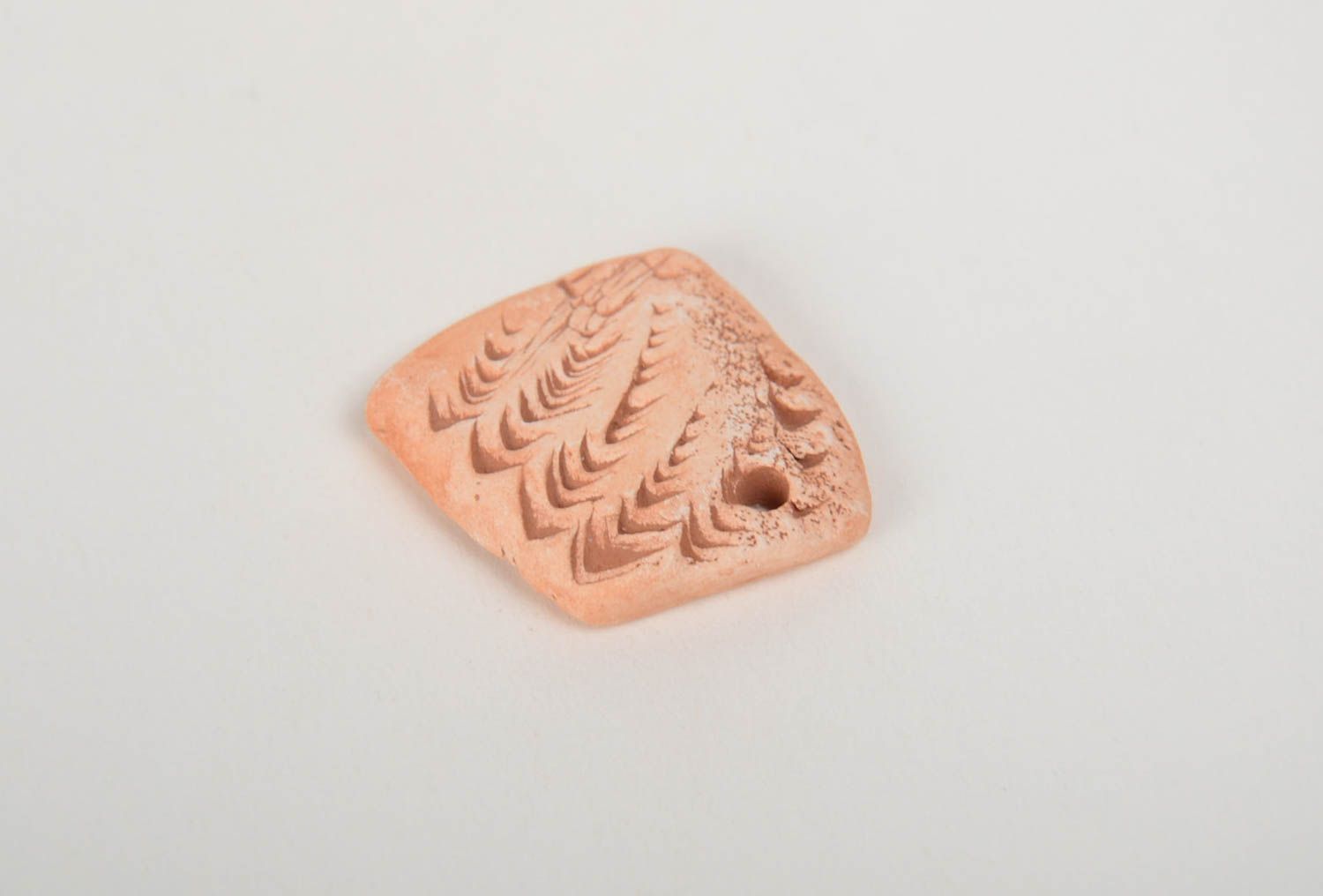 Small flat craft blank hand made of pottery clay for pendant necklace creation photo 4