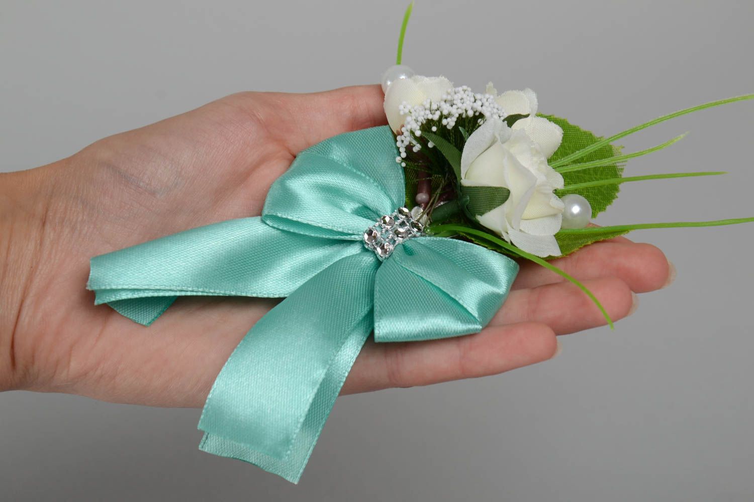 Beautiful handmade boutonniere for bride or groom of light color with flowers photo 5