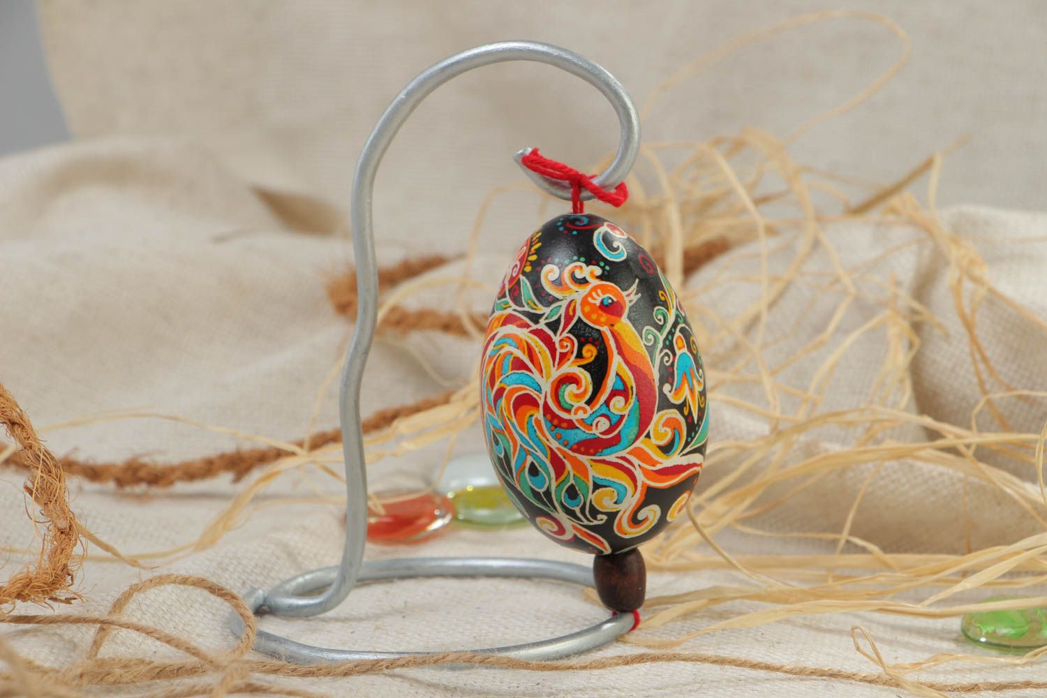 Handmade decorative Easter egg painted with wax and food dyes with metal stand photo 1