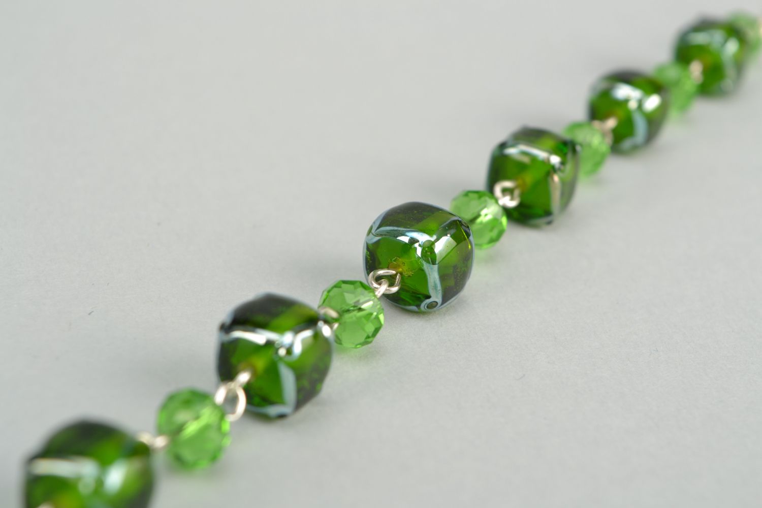 Handmade bracelet with glass beads and crystal of green color photo 4