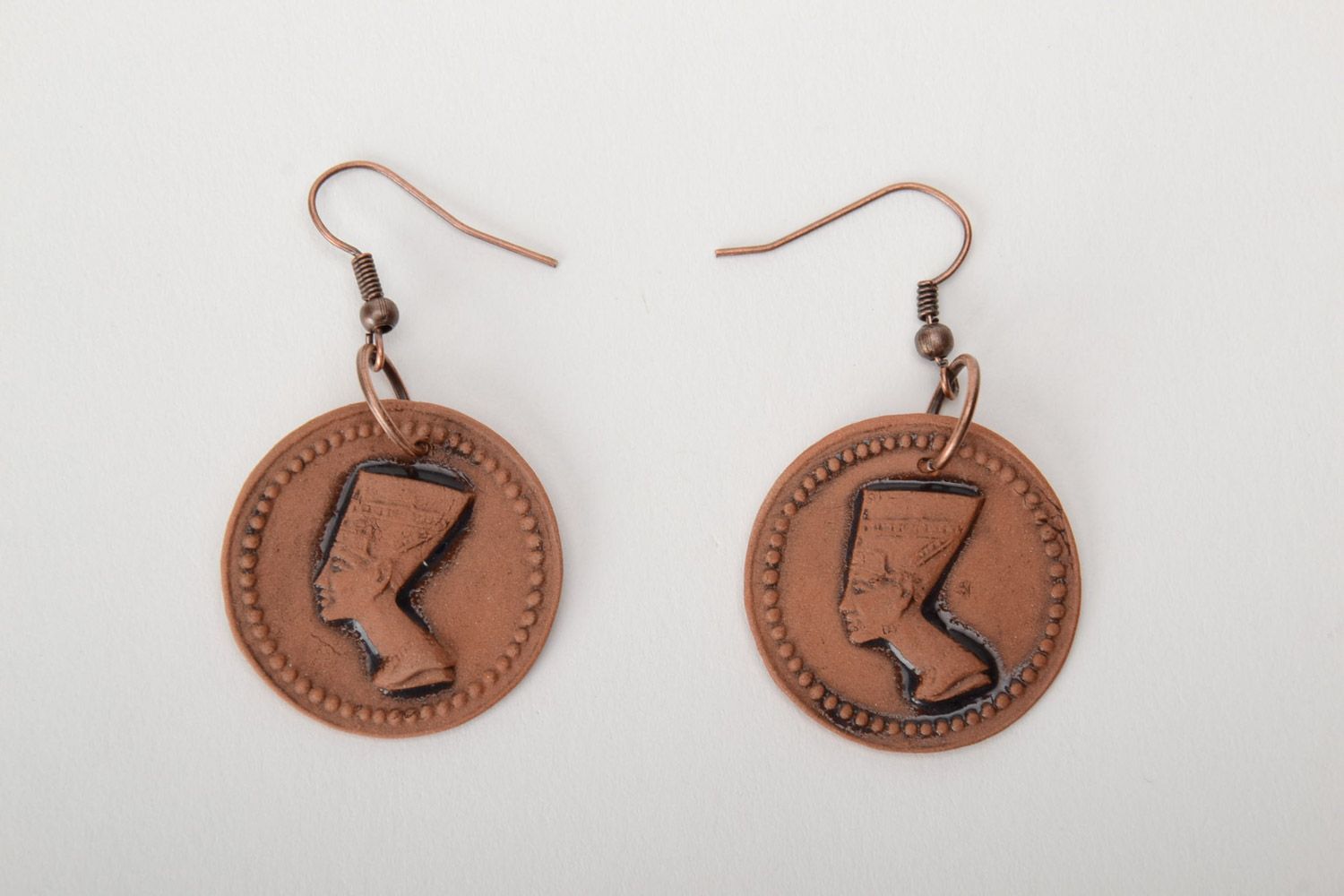 Women's round earrings hand made of brown clay with the image of Nefertiti photo 3