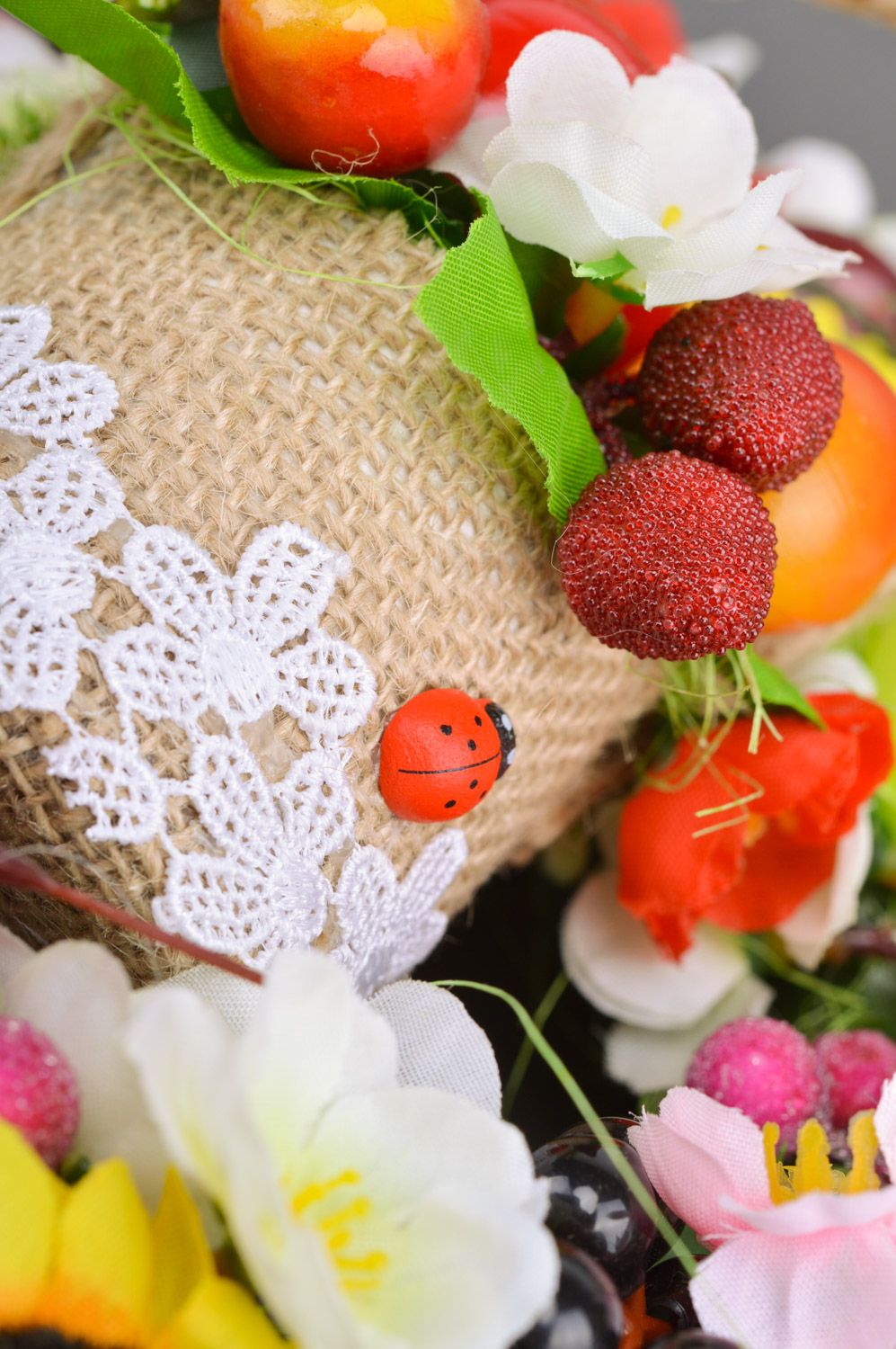 Handmade woven sisal basket with artificial fruit and flowers composition for home decor photo 4