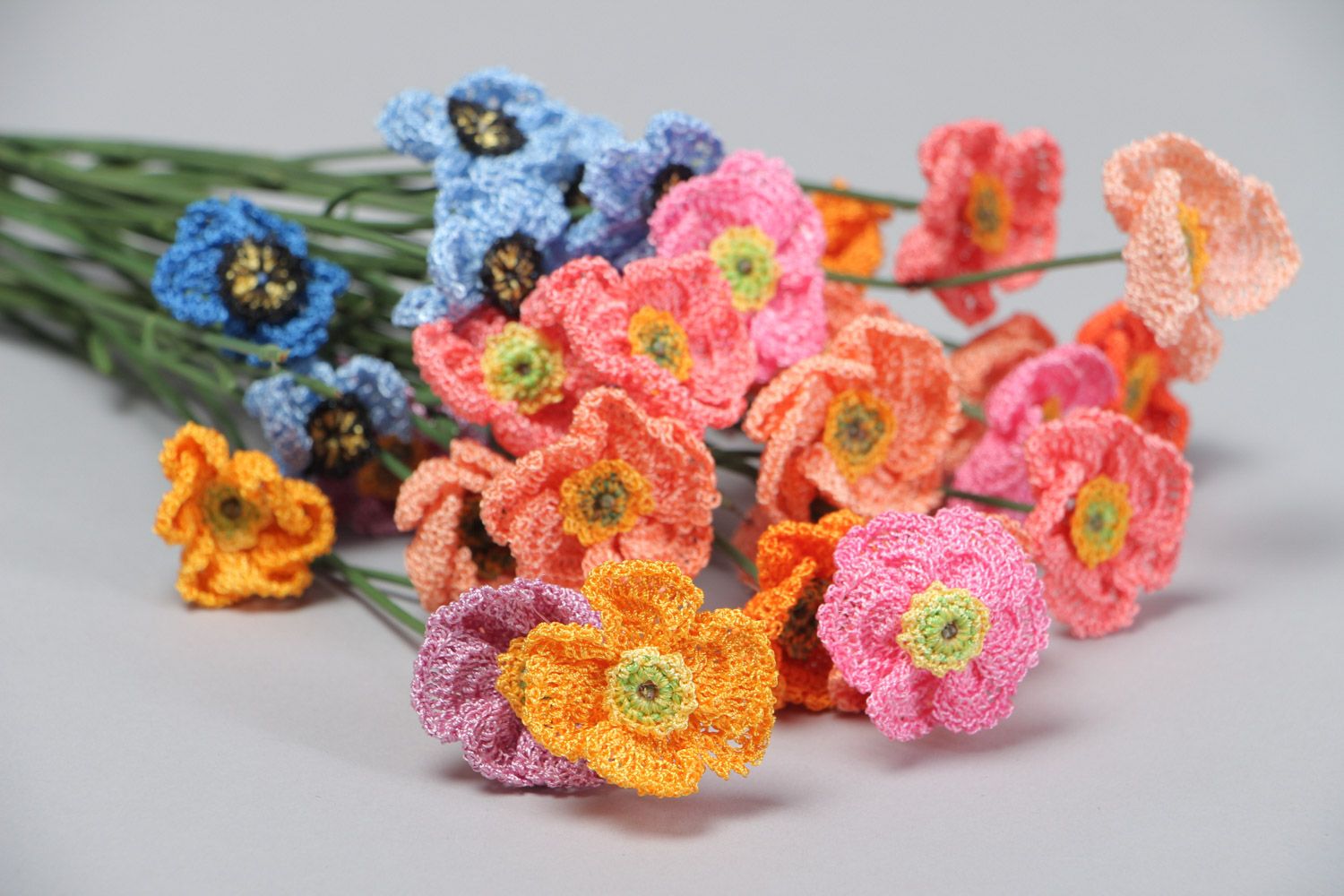 Bouquet of bright colorful decorative flowers crocheted of cotton threads photo 3