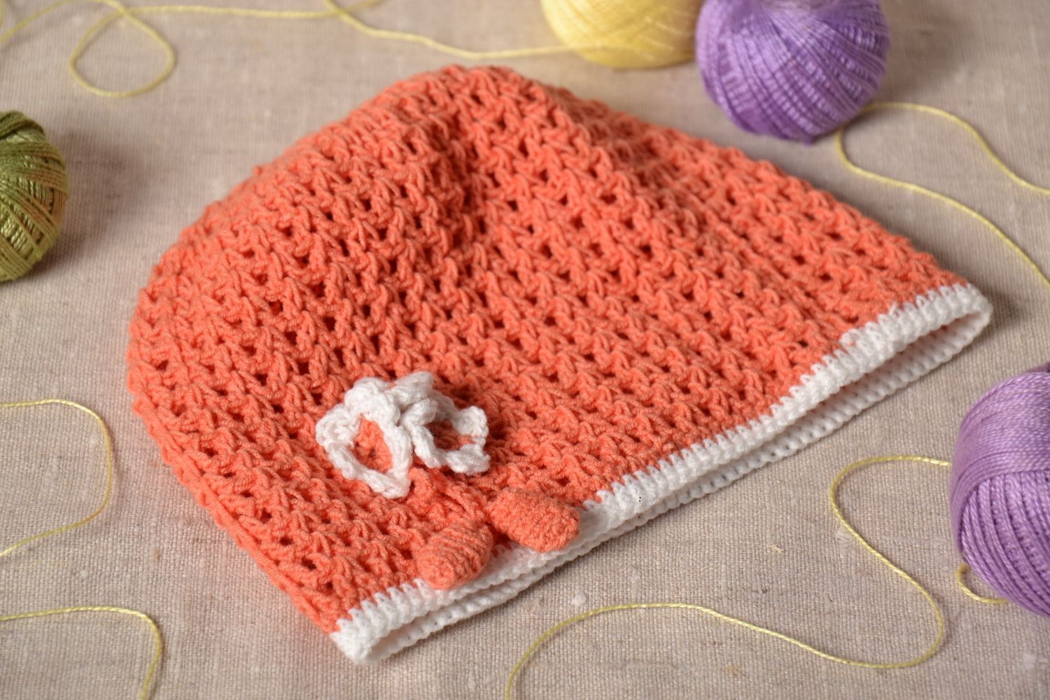 Hand crocheted hat of peach color   photo 1