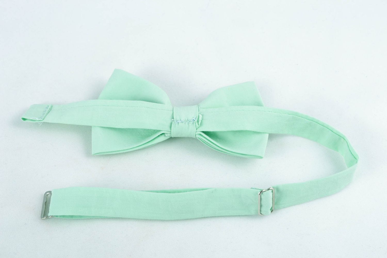 Fabric bow tie of light turquoise color photo 4
