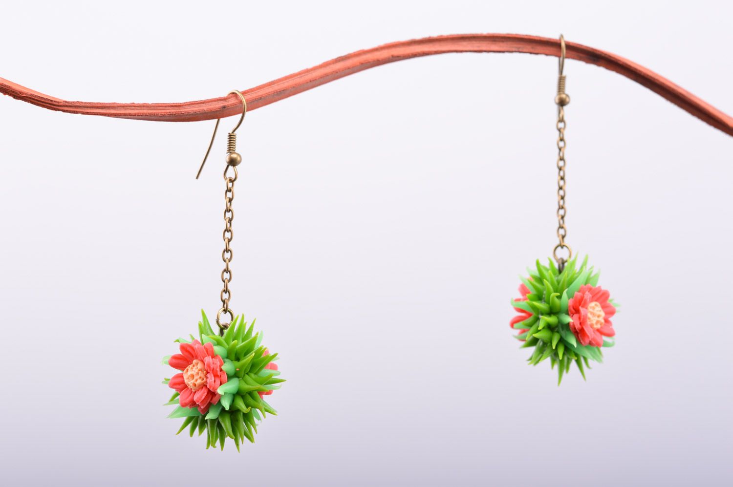 Bright handmade women's long plastic earrings in the shape of flowers photo 2