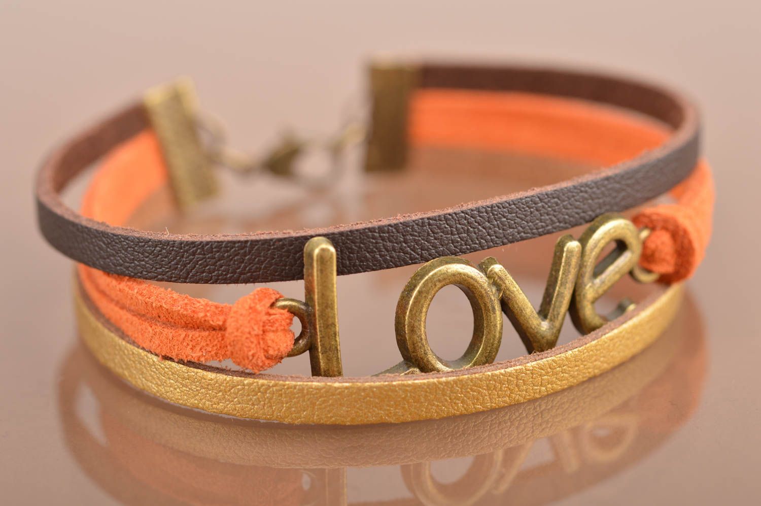 Unusual beautiful orange bracelet woven of suede cords with inserts Love photo 4