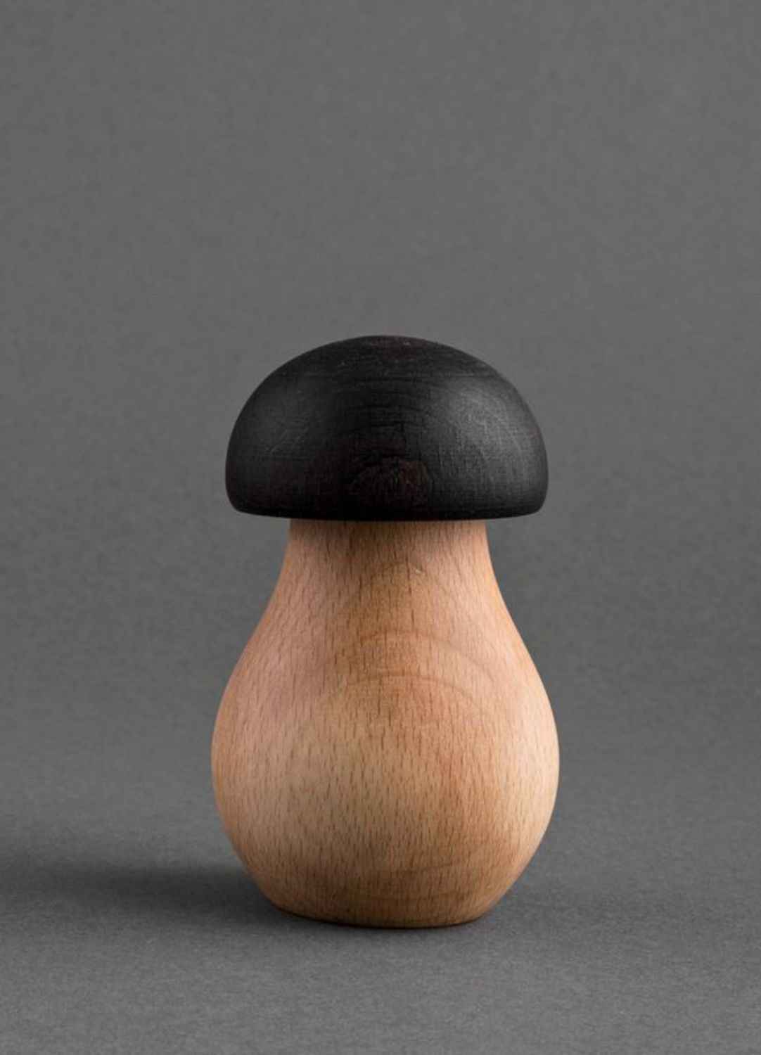 Wooden nutcracker in the shape of a mushroom photo 3